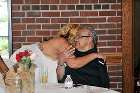 Erika Jackson hugging her grandmother-in law Kay Jackson at the wedding.