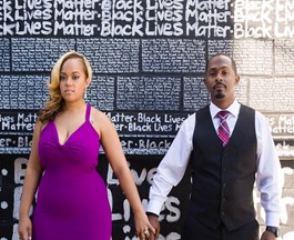 Corey and Erika pictured by Black Lives Matter mural.
