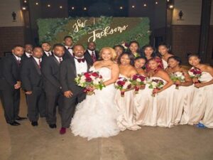 Mr. & Mrs. Corey and Erika Jackson with groomsmen and bridesmaids.