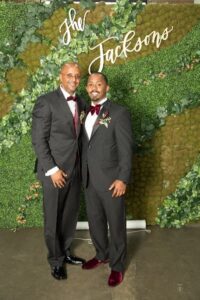 Tyrone Jackson with his son Corey Jackson enjoying the wedding.