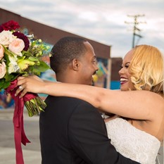 Corey and Erika Jackson enjoying an intimate moment at their wedding.
